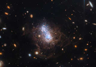 Composite infrared image of I Zwicky 18 taken with James Webb Telescope