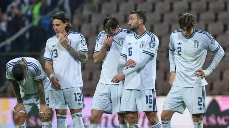 Dejected Italy players react on the pitch at Stadion Bilino Polje in Zenica after losing 4-1 on penalties to Bosnia in the FIFA World Cup 2026 playoff final