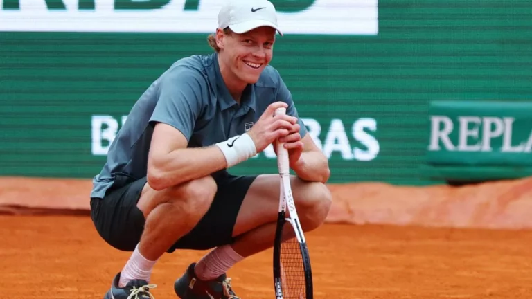 Jannik Sinner defeats Carlos Alcaraz 7-6, 6-3 in a wind-swept Monte Carlo final, claiming his first clay-court Masters 1000 title and the No. 1 ranking.