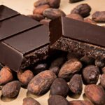Dark chocolate bar with cocoa beans