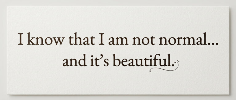 Alt Text (WordPress Alternative Text field): Elegant black serif quote "I know that I am not normal… and it's beautiful" printed on textured white paper.